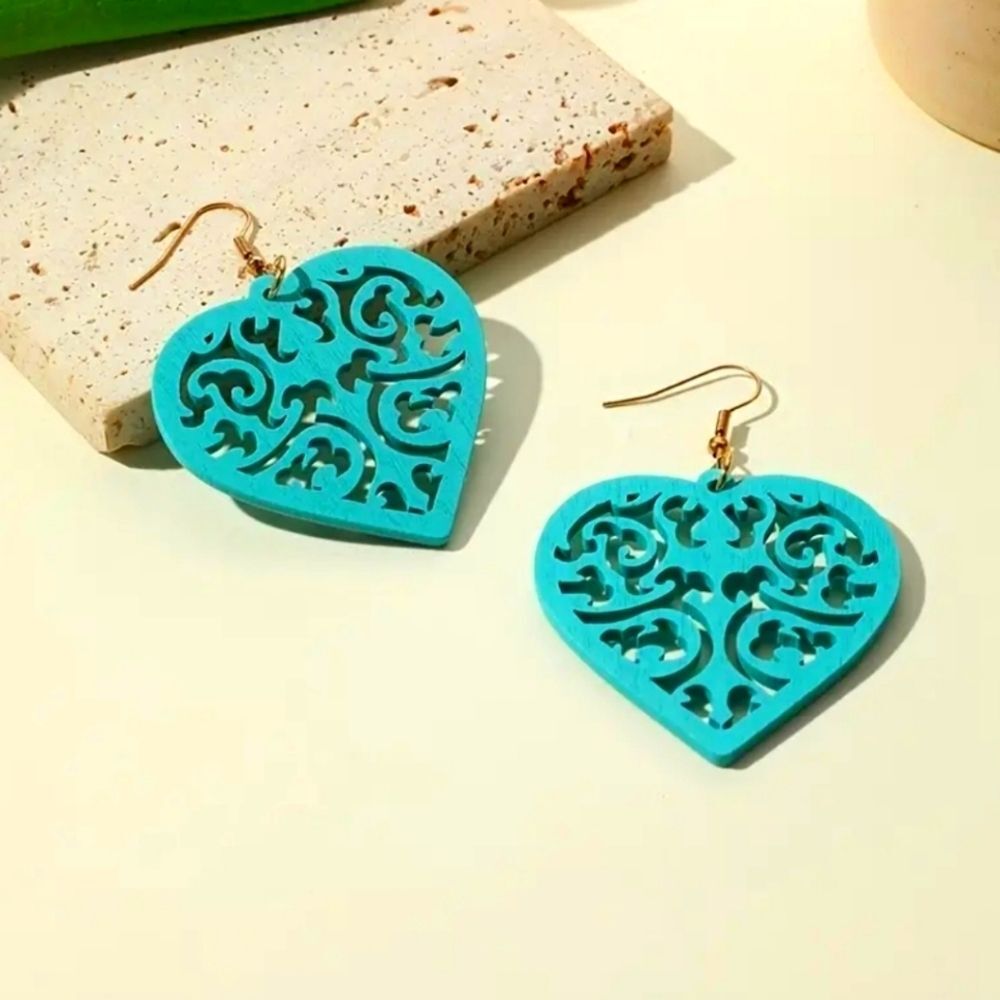 Aqua blue heart-shaped wood earrings carved design